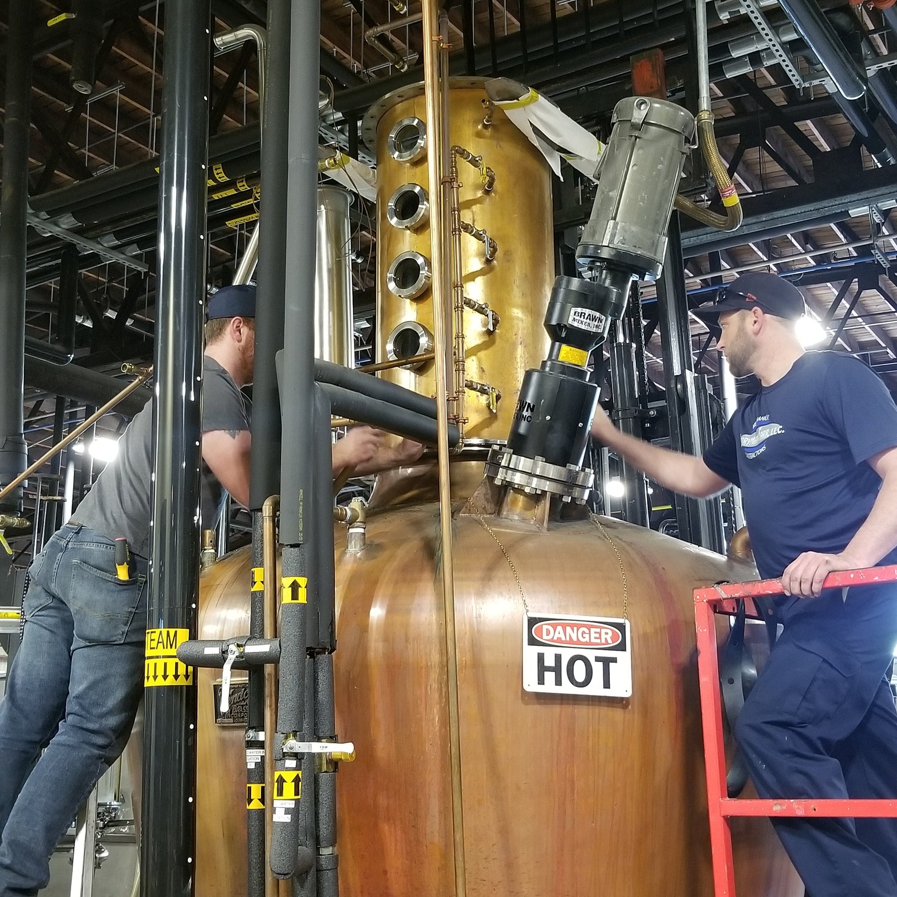 Installing copper distillation equipment on the production floor