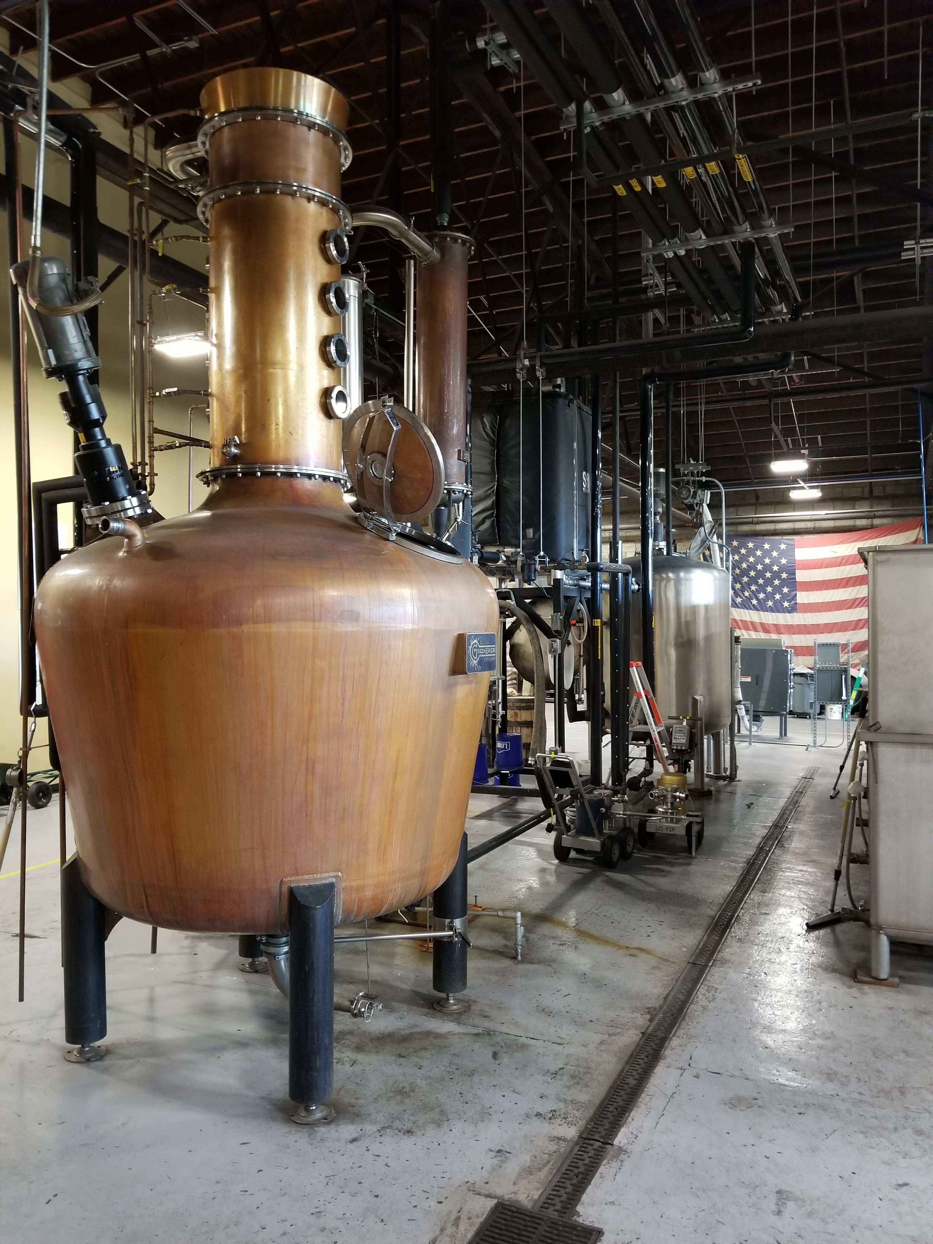 Copper pot still on a Tennessee distillery production floor