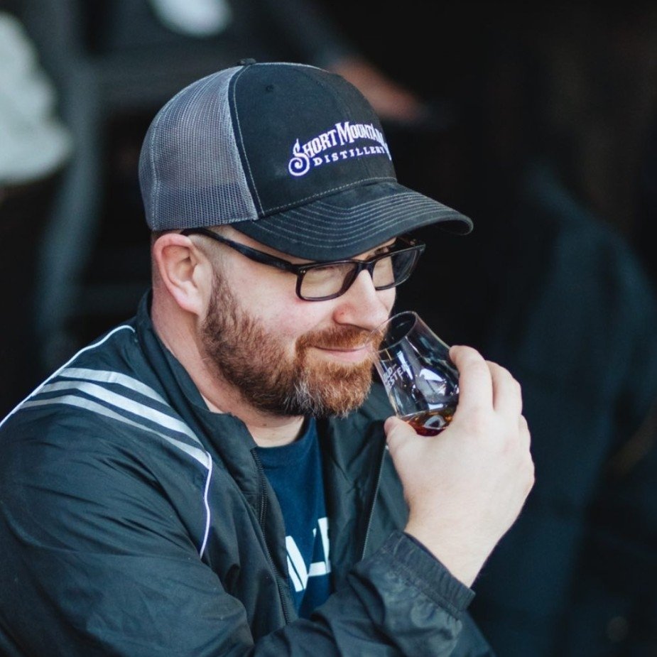 Brian Robertson conducting sensory evaluation of spirits